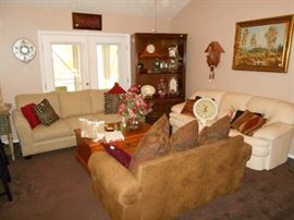 2 very nice sofas and an equally nice love seat