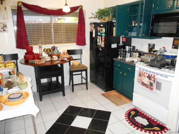 very cute kitchen items with bar height table and chairs