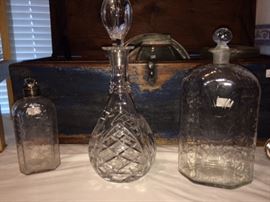 old bottles on the ends, Waterford in middle