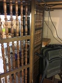 Vintage room divider made of hardwoods. Upper part made with spindles and lower part solid wood design in panels.
