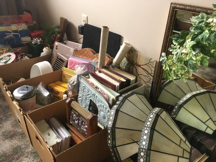 A pair of stained glass wall sconces, along with many worthy finds of home necessities and goods.