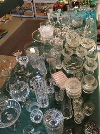 Crystal, of bowls, servers, vases, glassware, candle holders and etc. are bountiful.