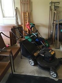 Yard and garden tools, Scotts spreader, Black and Decker electric edger, Yard Machines 21" lawn mower, etc...