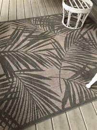 One of four outdoor rugs. Two large and two small.