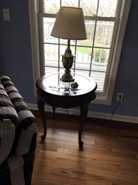 Glass and wood end table.
