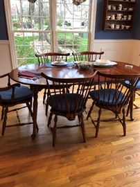 Table, leaf, 6 chairs (2 captain) and pads. Pennsylvania House.