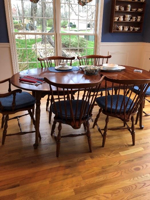 Table, leaf, 6 chairs (2 captain) and pads.  Pennsylvania House.