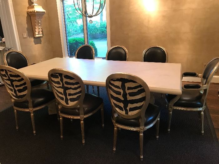 Michael Taylor Designs Stone Dinging Table with Split Lyre Base. Set of eight Nancy Corzine Louis XVI Dining Chairs. Set comprising of six side chairs and two arm chairs.