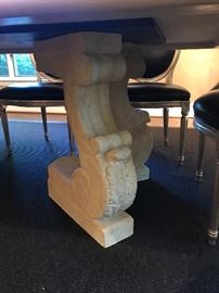 Michael Taylor Designs Stone Dinging Table with Split Lyre Base.