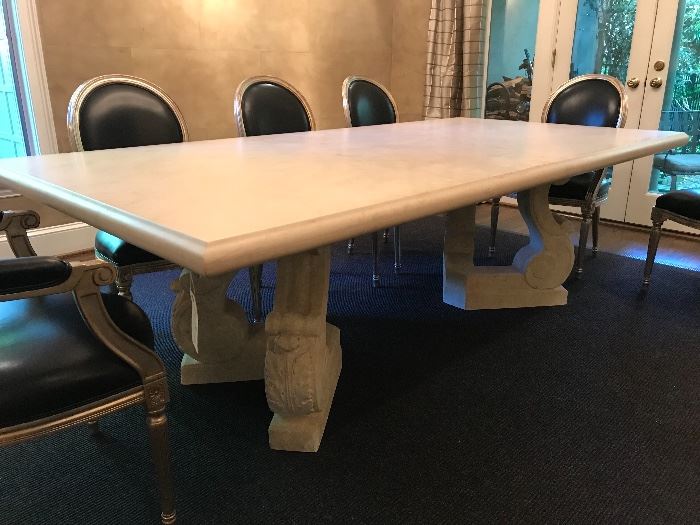 Michael Taylor Designs Stone Dinging Table with Split Lyre Base.