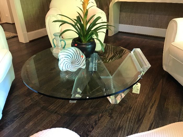 Stunning lucite cantilever coffee/cocktail table with round beveled glass.