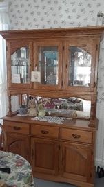 China cabinet loads of glassware.