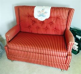 Upholstered Rocking Love Seat With Tufted Back