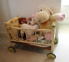 Vintage Baby Doll Bed With Metal Wheels And Stuffed Animals