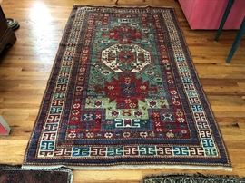 Measures 4’10” x  7’5”. 