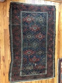 Measures 2’8” x 4’4”. 