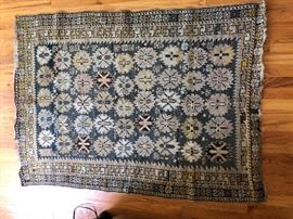 Measures 3’8” x 5’. 