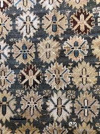 Measures 3’8” x 5’. 