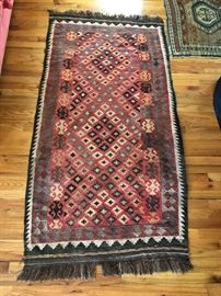 Measures 3’4” x 6’4”. 