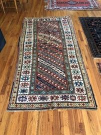 Measures 3’10” x 7’9”. 