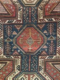 Measures 3’3” x 5’2”. 