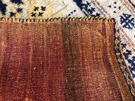 Measures 2’3” x 3’6”. 