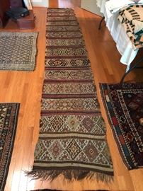 Measures 2’1” x 11’4”. 