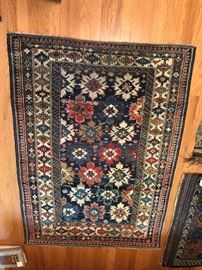 Measures 3’7” x 4’10”.