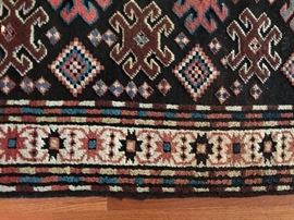 Measures 4’8” x 6’8”. 