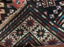 Measures 4’8” x 6’8”. 