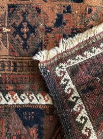 Measures 2’11” x 5’. 