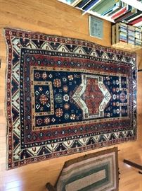 Measures 4’2” x 6’. 