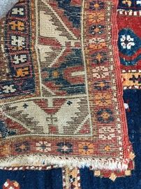 Measures 4’2” x 6’. 