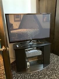 Flatscreen TV and Cabinet