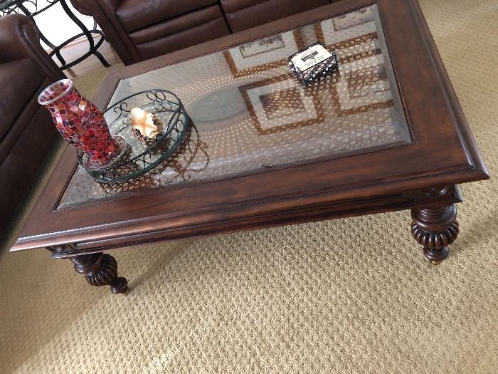 Solid wood coffee table with glass top $130