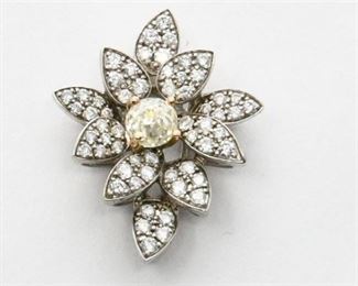 7. 14k white gold pendant with diamonds