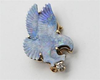 16. Rare Antique Carved Eagle on boulder opal