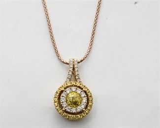 32. 14kyg yellow fancy diamond pendant on rose gold chain