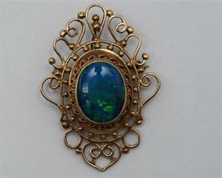 54. 14 K Yellow Gold and Opal Dress Pin