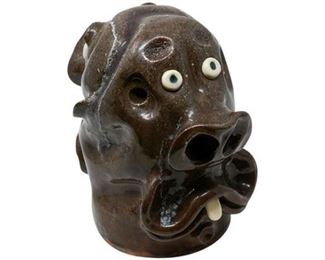 77. Ronald Gordon 2 faced jug