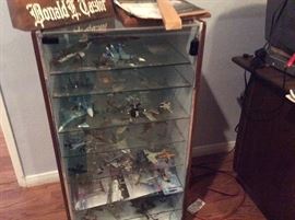 Model airplanes and display case