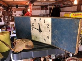 Vintage clock with Philip Morris advertising under the blue paint