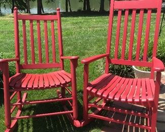  Pair of red rocking chairs