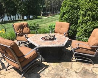 Gas fire pit and 4 chairs (priced separately)