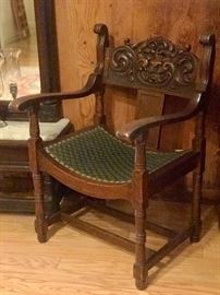 antique carved arm chair