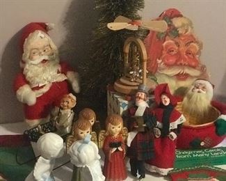 Lots of vintage Christmas and scary Santas only The Elf On The Shelf could love .