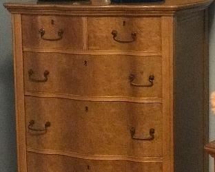 antique serpentine tall chest