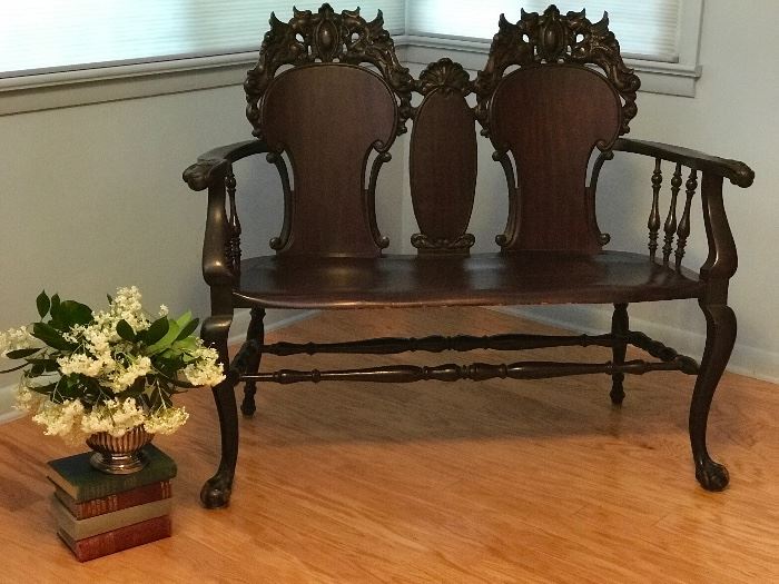 Antique solid mahogany Victorian  carved claw foot settee Stickley and Brandt Chair co, Carved winged griffin and floral motif, Super piece.