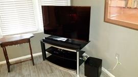 54" Samsung flat screen TV, with stand