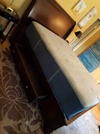 Queen bed with underneath storage on 1 side